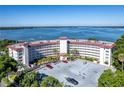 Condo building with waterfront views and parking at 601 N Mcdonald St # 608, Mount Dora, FL 32757