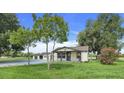 Newly renovated home with a two car garage and large yard at 13832 Bay Lake Rd, Groveland, FL 34736
