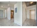 Elegant entryway with marble floors and access to bathroom at 155 S Court Ave # 1507, Orlando, FL 32801