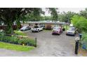 Aerial view of a ranch style home with a large yard and driveway at 1817 Demastus Ln, Ocoee, FL 34761