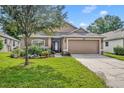 Beautiful curb appeal, one story house with attached garage at 3921 Doune Way, Clermont, FL 34711