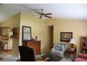 Living room features a view into the kitchen at 4269 Lake Eleanor Dr, Mount Dora, FL 32757