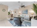 Spacious living room with comfortable seating and large TV at 3401 Fairfield St, The Villages, FL 32162