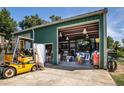 Spacious workshop with high ceilings and ample storage at 19402 E 5Th St, Umatilla, FL 32784