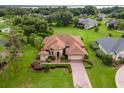 Aerial view of a house in a residential neighborhood at 39644 Harbor Hills Blvd, Lady Lake, FL 32159