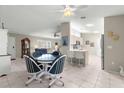 Bright kitchen features stainless steel appliances and ample cabinet space at 9823 Se 178Th Ln, Summerfield, FL 34491