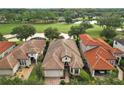 Luxury homes community with golf course and pond views at 9323 San Jose Blvd, Howey In The Hills, FL 34737