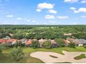 Luxury homes overlooking a lush golf course at 9323 San Jose Blvd, Howey In The Hills, FL 34737