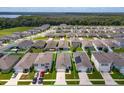 Aerial view of house and surrounding neighborhood at 3654 Caspian St, Leesburg, FL 34748