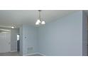 Bright dining area with light walls and a ceiling fixture at 3654 Caspian St, Leesburg, FL 34748