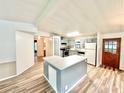 Spacious kitchen featuring an island and stainless steel appliances at 1900 Stacey Dr, Mount Dora, FL 32757