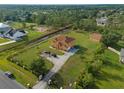 Property features a large lot, detached building, and spacious driveway at 18744 Sabal St, Orlando, FL 32833