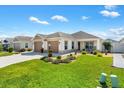 Charming single story home with two car garage and landscaped yard at 1412 Franklin Ct, The Villages, FL 32163