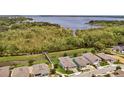Waterfront community with homes near a tranquil waterway at 1180 Dora Parc Ln, Mount Dora, FL 32757