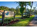 Lake Joanna Estates entrance with landscaping and sign at 3064 Windham Dr, Eustis, FL 32726