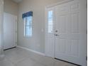 Spacious entryway with tile floor and closet at 753 Palma Dr, The Villages, FL 32159