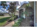 House exterior with walkway and landscaping at 5000 Portsmouth St, Tavares, FL 32778