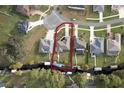 Aerial view of canal-front property with large lot at 34932 Golden Tree Dr, Leesburg, FL 34788