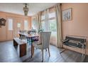 Unique dining room with a wooden table and eclectic decor at 351 W 10Th Ave, Mount Dora, FL 32757