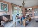 Bright dining room with wooden table, eclectic decor, and built-in shelves at 351 W 10Th Ave, Mount Dora, FL 32757