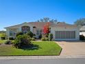 Single-story house with attractive curb appeal at 21732 King Henry Ave, Leesburg, FL 34748
