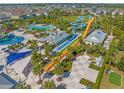 Community features a large pool, water slides, and other amenities at 291 Falls Dr, Kissimmee, FL 34747