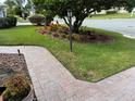 Brick walkway leading to the house entrance at 21630 King Henry Ave, Leesburg, FL 34748