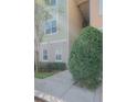 Building exterior showcasing a well-maintained property with landscaping at 3406 Soho St # 102, Orlando, FL 32835