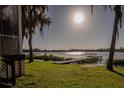 Lakefront property with private dock and serene view at 7422 Edgewood Boys Ranch Rd, Groveland, FL 34736