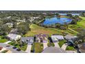 Aerial view showcasing a single-Gathering home's location in a neighborhood at 25114 Meriweather Rd, Leesburg, FL 34748