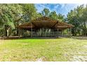 Wooden barn with open sides at 9442 Cr 674, Bushnell, FL 33513