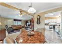 Open concept dining area with views into living room and kitchen at 1435 Mohawk Cir, Tavares, FL 32778