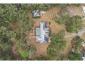Aerial view showing home, pool, and surrounding landscape at 34620 Galla Rd, Fruitland Park, FL 34731