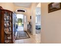 View of the backyard from the entryway at 5717 Illumination Ln, Leesburg, FL 34748