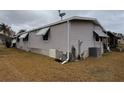 Side view of mobile home showing additional details at 1335 E Schwartz Blvd, Lady Lake, FL 32159