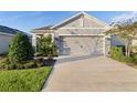 Curb appeal abounds in this charming one-story home! at 5300 Sunshine Dr, Wildwood, FL 34785