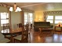 Spacious living area with hardwood floors at 101 Mango Cv, Leesburg, FL 34748