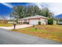 One story home with a two-car garage and spacious yard at 202 Forest Park Ln, Lady Lake, FL 32159