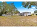 Large backyard with chain link fence at 17925 Se 100Th Ter, Summerfield, FL 34491
