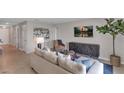 Relaxing living room with comfy seating and large TV at 2986 Supermarine Rd, Tavares, FL 32778