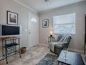 Cozy living room with comfy seating and a modern aesthetic at 32314 Oak Park Dr, Leesburg, FL 34748