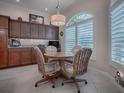 Cozy kitchen nook with a round table and four chairs at 630 Laurel Run, The Villages, FL 32162