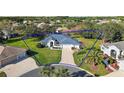 Single-Gathering home on a corner lot with a large yard at 27437 Desert Rose Ct, Leesburg, FL 34748