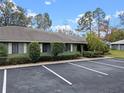 Green house exterior with parking and landscaping at 636 Mount Homer Rd # 636, Eustis, FL 32726