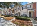 Townhouse with landscaping, driveway, and walkway at 4904 Sw 45Th St, Ocala, FL 34474