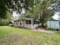 Cozy one-story home with screened porch at 14468 Ne 204Th Ln, Fort Mc Coy, FL 32134
