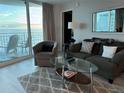 Spacious living room with ocean view and comfortable seating at 2625 S Atlantic Ave # 9Ne, Daytona Beach, FL 32118