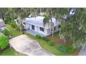 Aerial view of the house, showing its location and surrounding area at 103 13Th Se St, Winter Haven, FL 33880