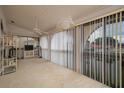 Bright sunroom with plenty of natural light and access to the outdoors at 8203 Village Dr # 8203, Lake Wales, FL 33898