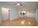 Open-concept living and dining area adjacent to the kitchen at 5011 Hemingway Cir # 5011, Haines City, FL 33844